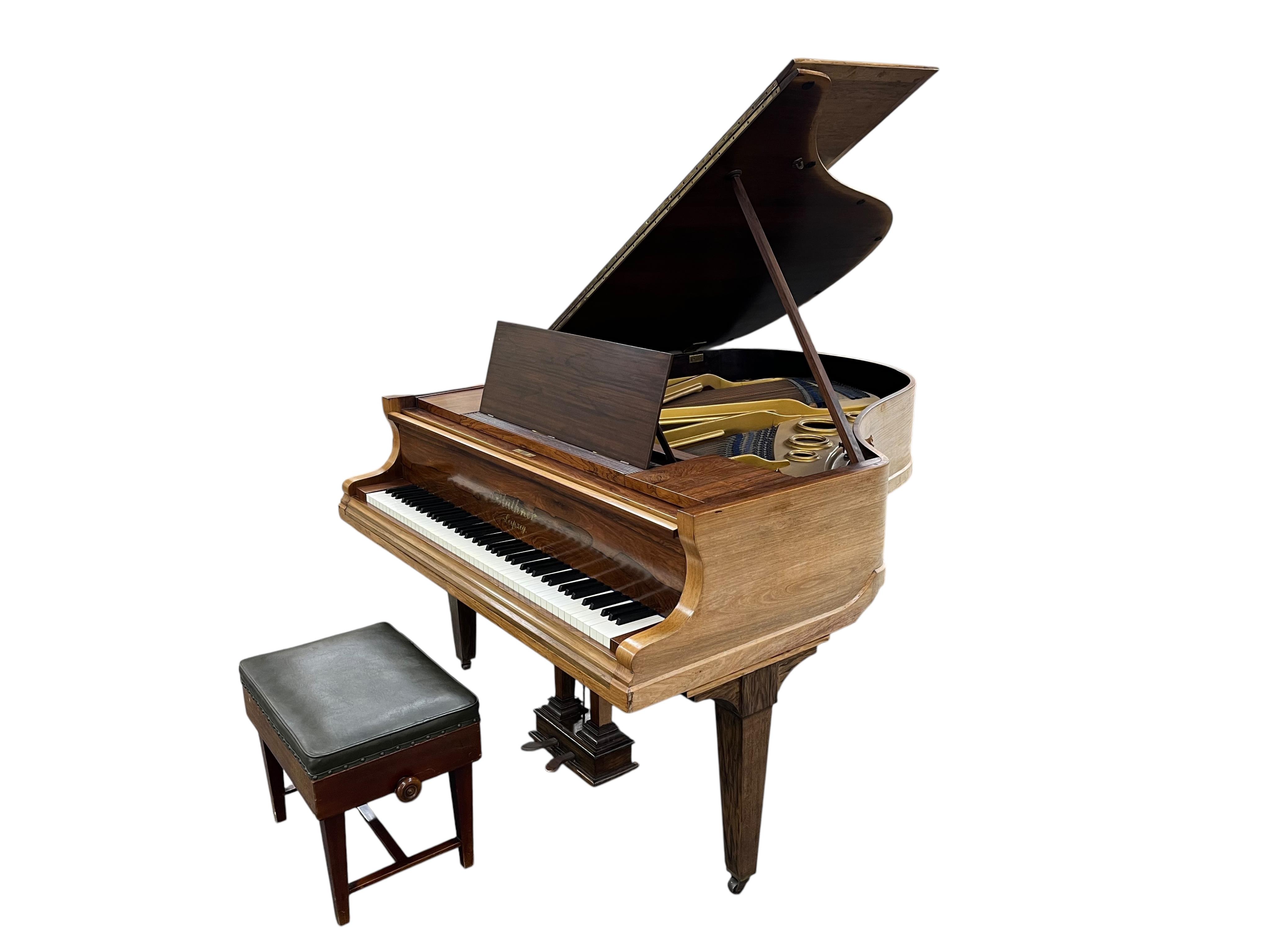 A Bluthner faded rosewood baby grand piano circa 1914, 176cm together with an adjustable piano stool. CITES Submission reference HWK4RNUW